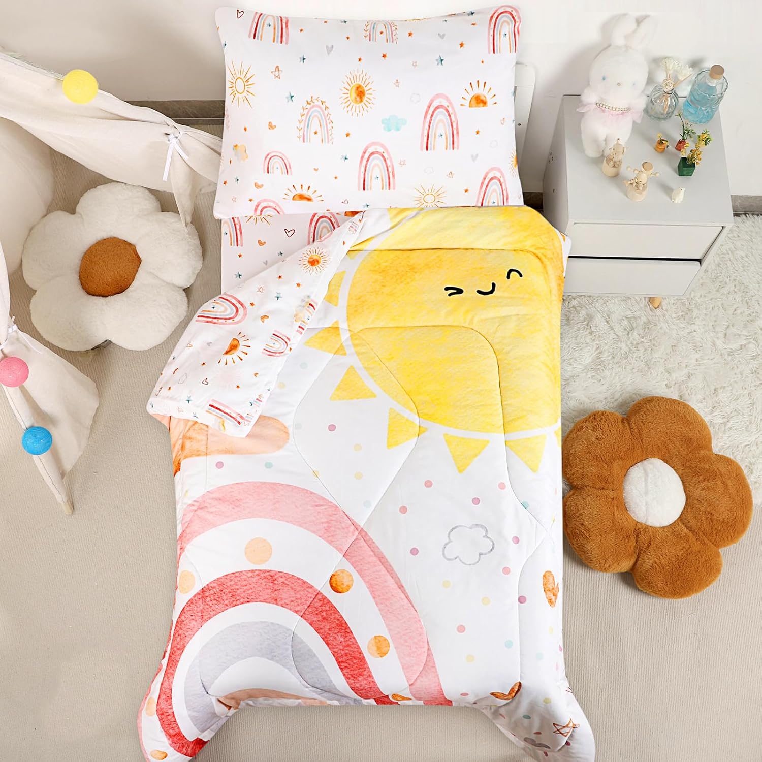 CARUILI 4 piece rainbow toddler girl bedding set front view on bed