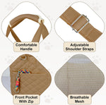 Small dog sitting inside the YooxArmor quilted pet carrier