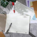 Zhanmai calculation pad sheet placed inside a standard binder