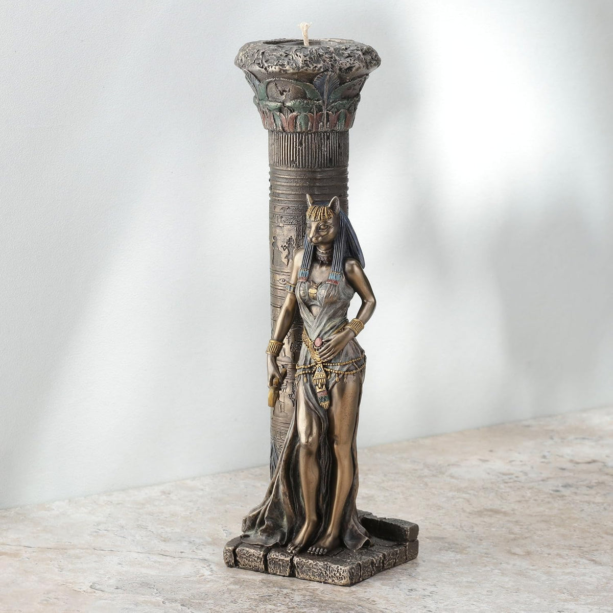 Rear perspective of the Bastet statue highlighting cold cast bronze texture