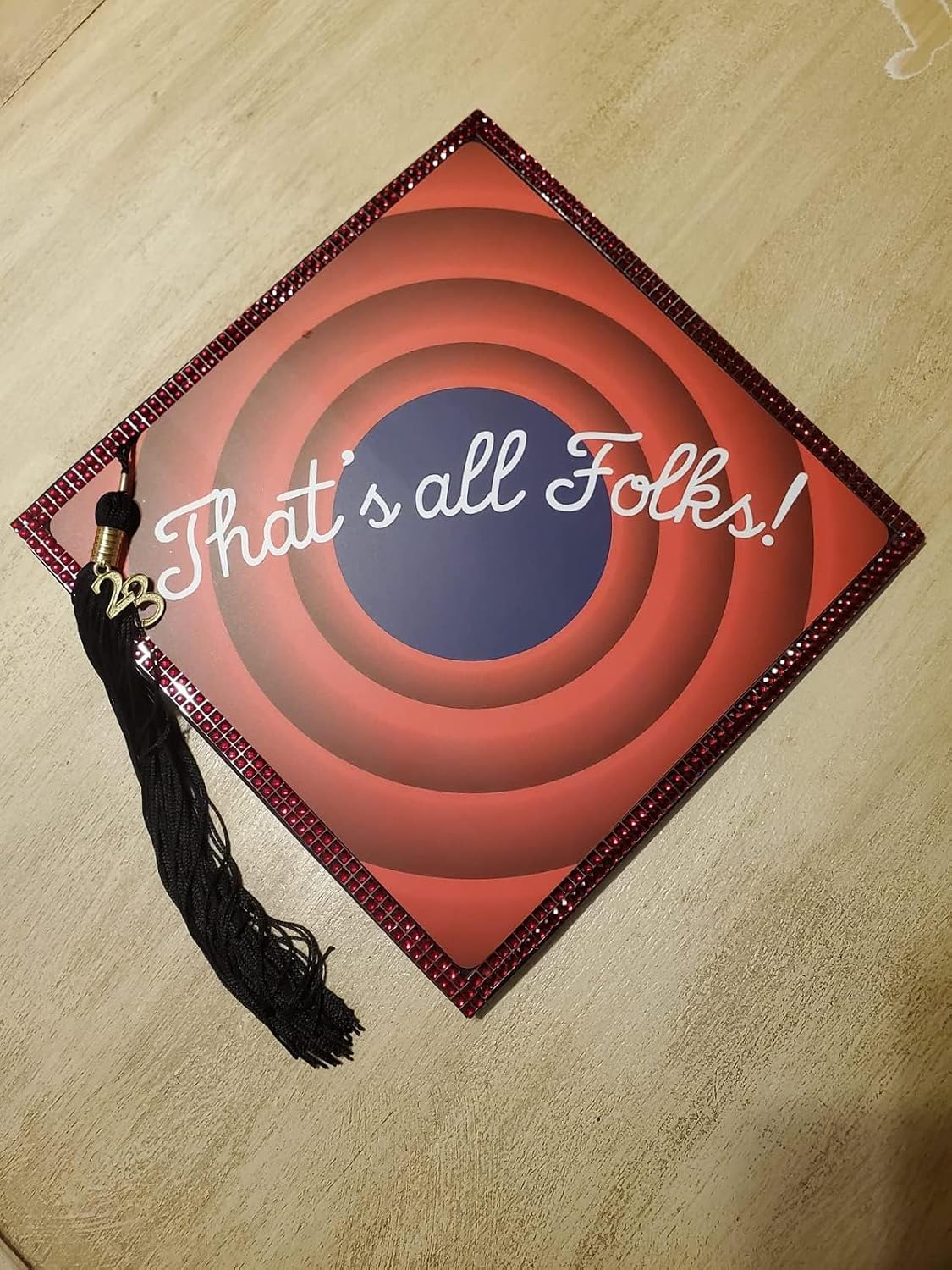 Tassel Toppers plastic grad cap decoration closeup