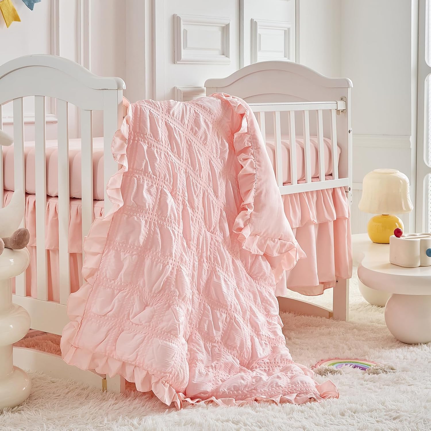 Uozzi Bedding ruffled crib set pink boho quilted comforter front view