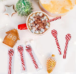 Fun Express Christmas candy cane spoons arranged as stocking stuffers