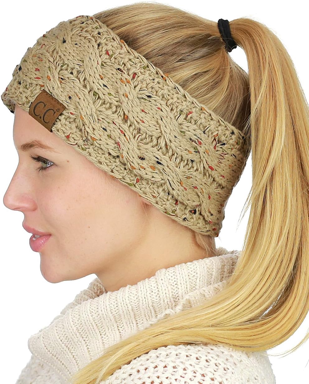 C.C winter headband close up of signature leather brand tag