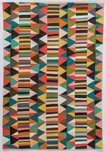 Side profile of Improv Patchwork paperback showing spine details