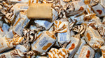 A collection of thirty three wrapped pieces of gourmet sugar free sweets highlighting portion control.