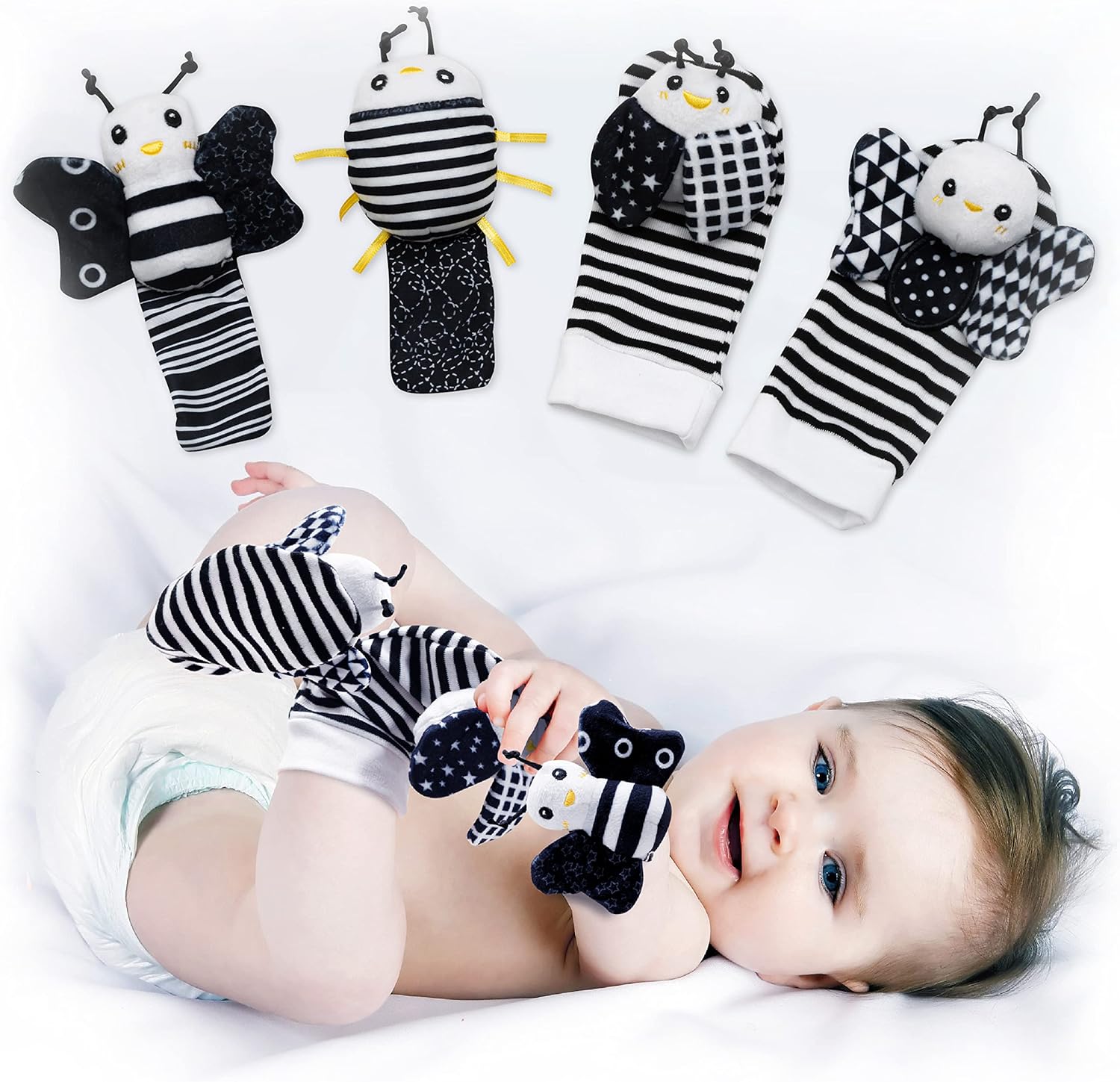 BABY K Foot Finder Socks and Wrist Rattles Set E front view showcasing high contrast black and white animal designs for sensory play.