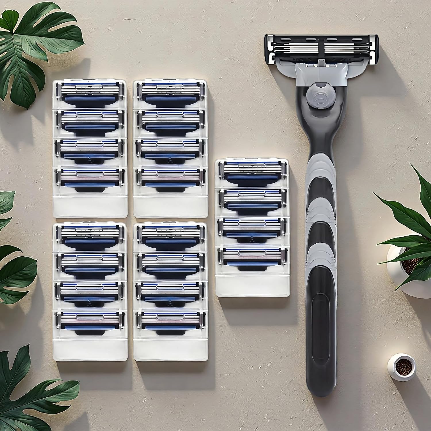 Gillette Mach3 manual razor front view featuring grey ergonomic handle and three layer blade cartridge.
