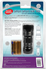 Simple Solution pet odor locator flashlight demonstrating stain visibility