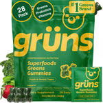 Grüns Adult Super Greens Multivitamin Gummies front view pouch containing twenty eight individual daily snack packs for comprehensive nutrition.