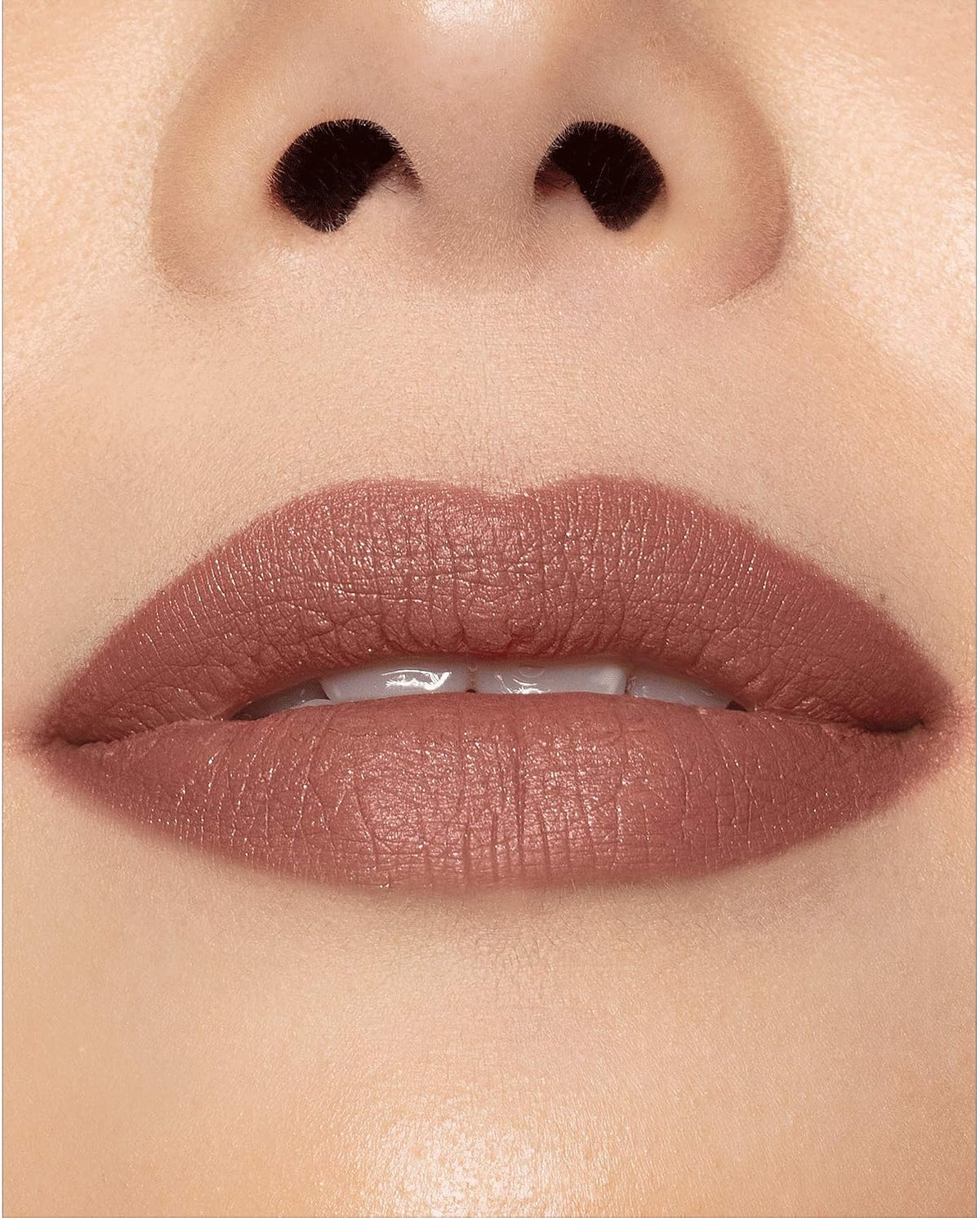 Milani vegan and cruelty free lip color crayon swatched on hand