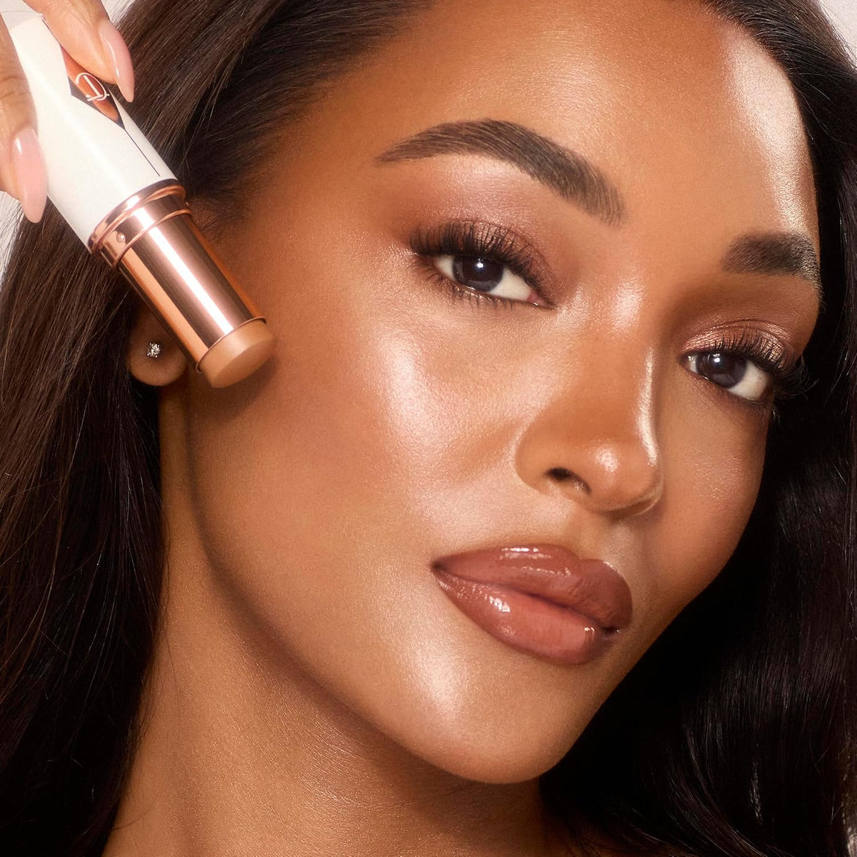 Charlotte Tilbury Unreal Skin Tint rose gold cap detail