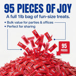 Close up look at the soft chewy red candy twists inside their fresh plastic wrappers