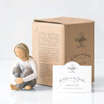 Willow Tree Spirited Child sculpture styled with other family groupings