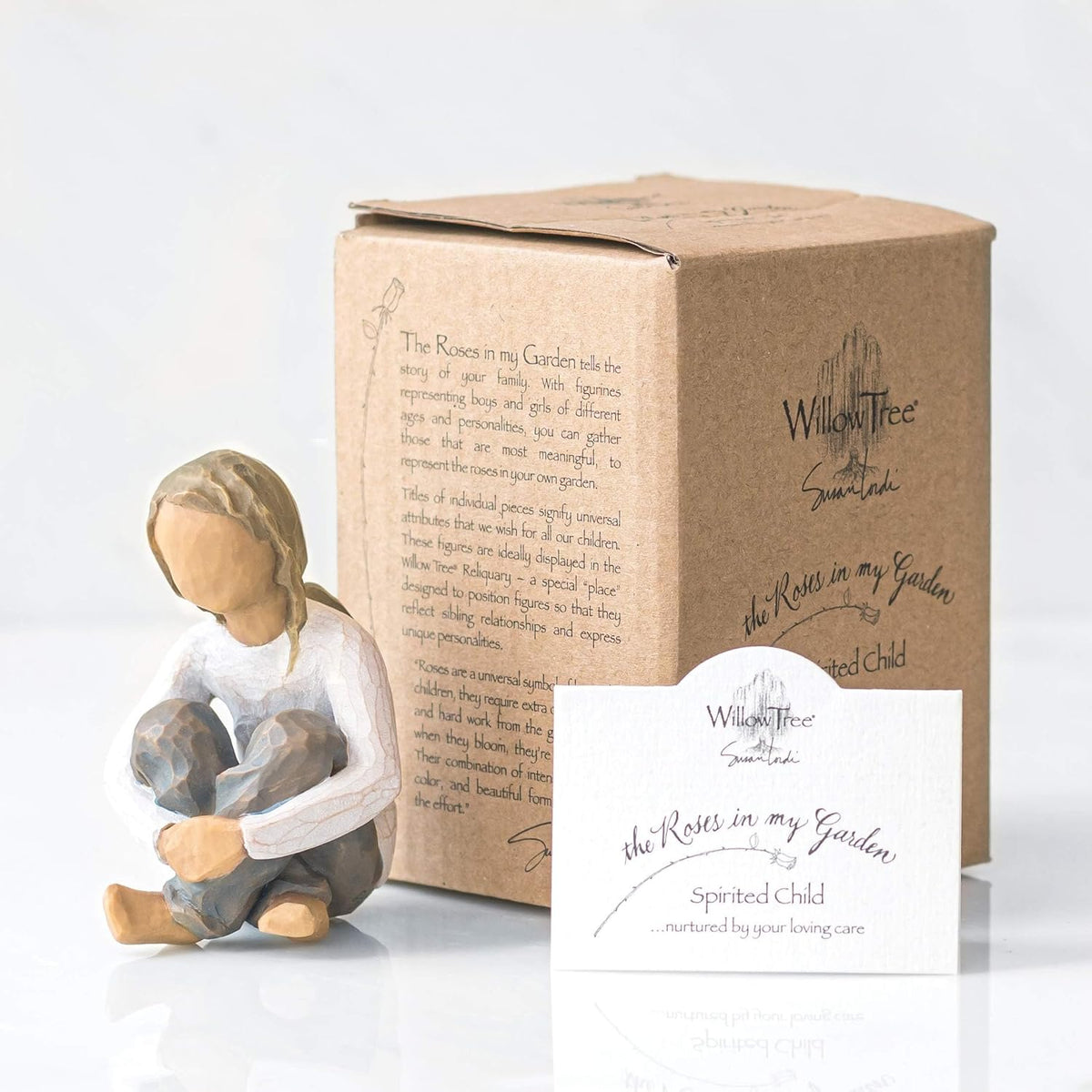 Willow Tree Spirited Child sculpture styled with other family groupings