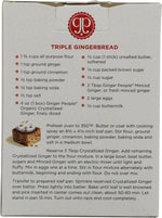 Diced organic crystallized ginger pieces displayed outside the packaging highlighting the natural texture.