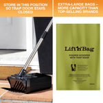 Neater Pet Brands long handle pet waste clean up tool on concrete pavement.