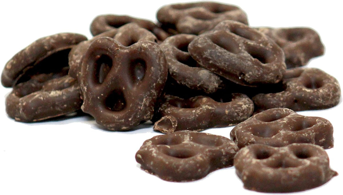 Close up view of crunchy mini pretzels coated in smooth dark chocolate