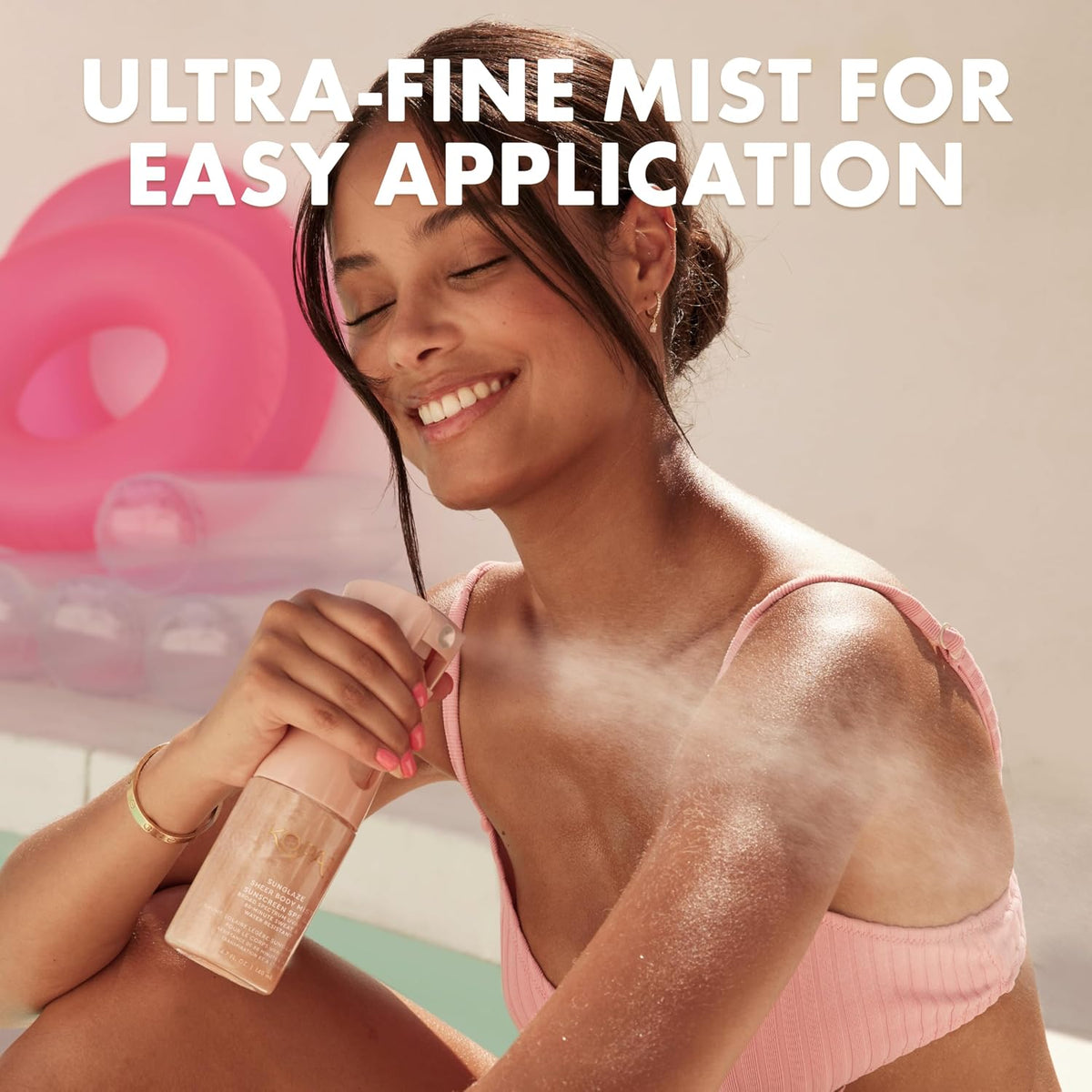 Kopari Rose Gold Sunglaze shimmering body mist swatch showing glowing rose gold finish