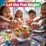 Vibrant mixture of imported Zestix chewy candy pieces spread out on a white surface.