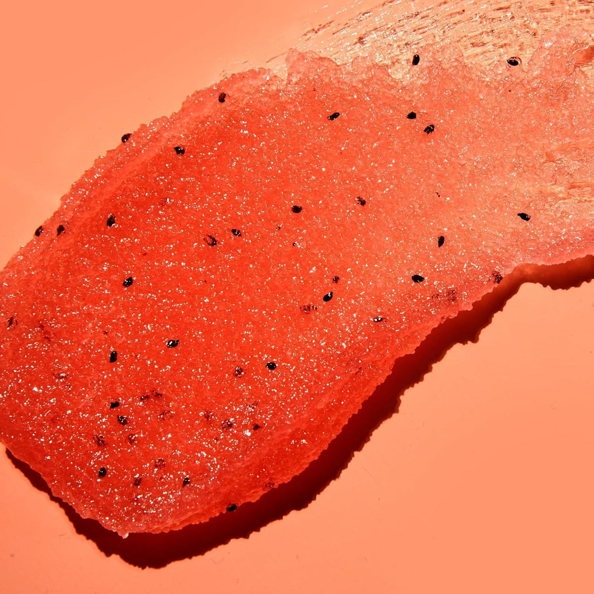 Close up shot showing sugar granule exfoliation texture of Tree Hut Watermelon scrub