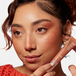 Milani Cheek Kiss Liquid Blush packaging showing twist-lock cap