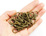 Pack of 50 DIY craft lobster claw clasps arranged neatly.