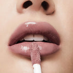 Milani lip gloss Rosewood shade applied on lips demonstrating high gloss volumizing effect.