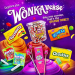 Authentic USA imported Ferrara Jujyfruits candy pouch placed next to scattered colorful sweets