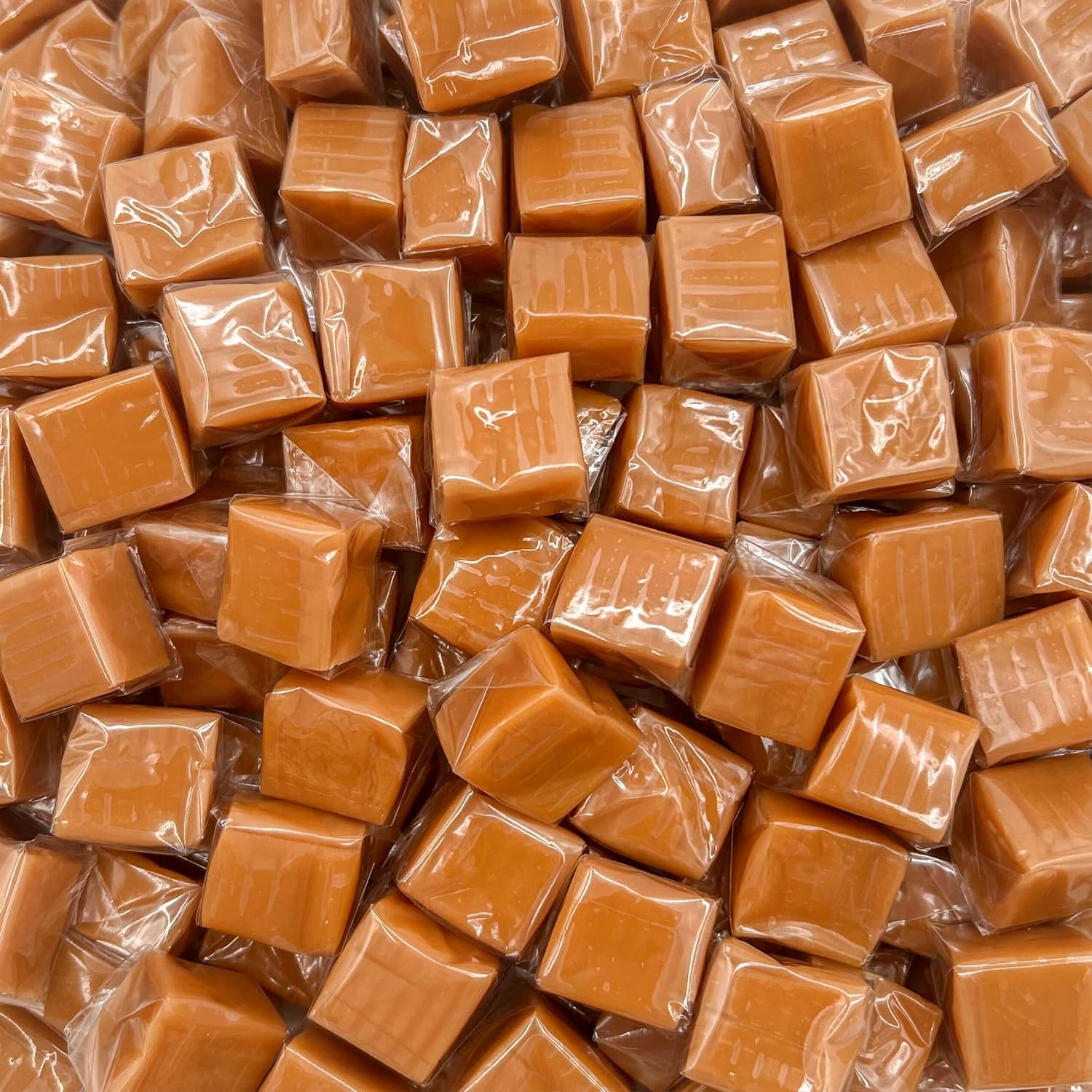 iLike! Caramel Cubes Candy front view of the bulk two pound bag showing individually wrapped squares.