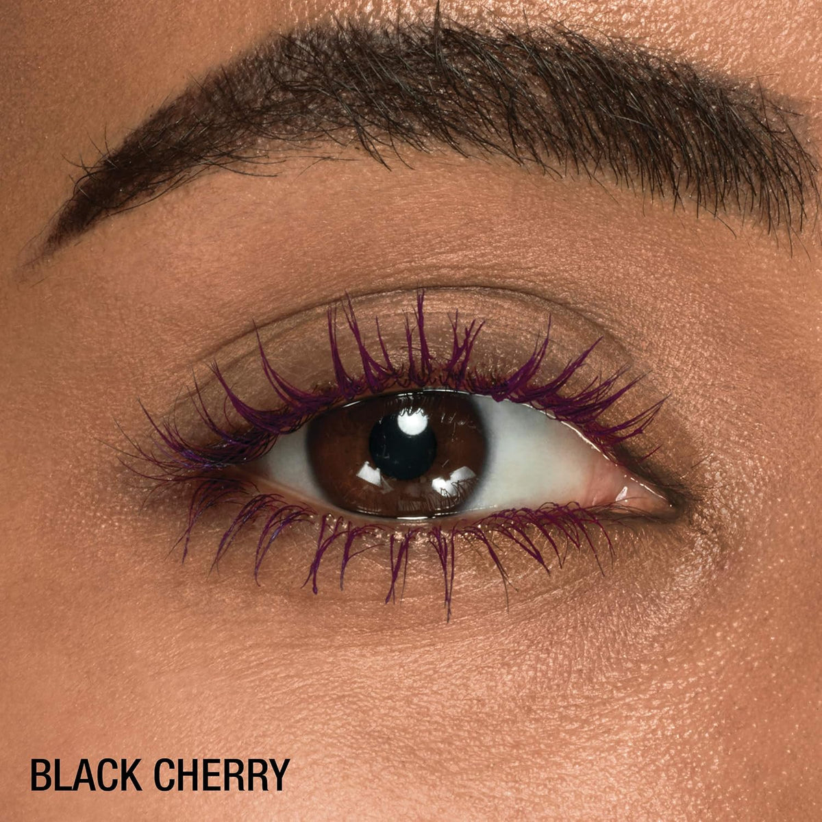 Black Cherry shade mascara swatch on hand