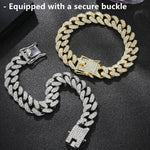 DKJEkdje gold dog chain accessory laid flat highlighting the eleven inch miami cuban links