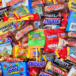 Assorted USA imported chocolate candies spread out from the bulk Munchique bag
