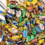 Premium confectionery display of approximately 75 pieces of assorted sweet toffees