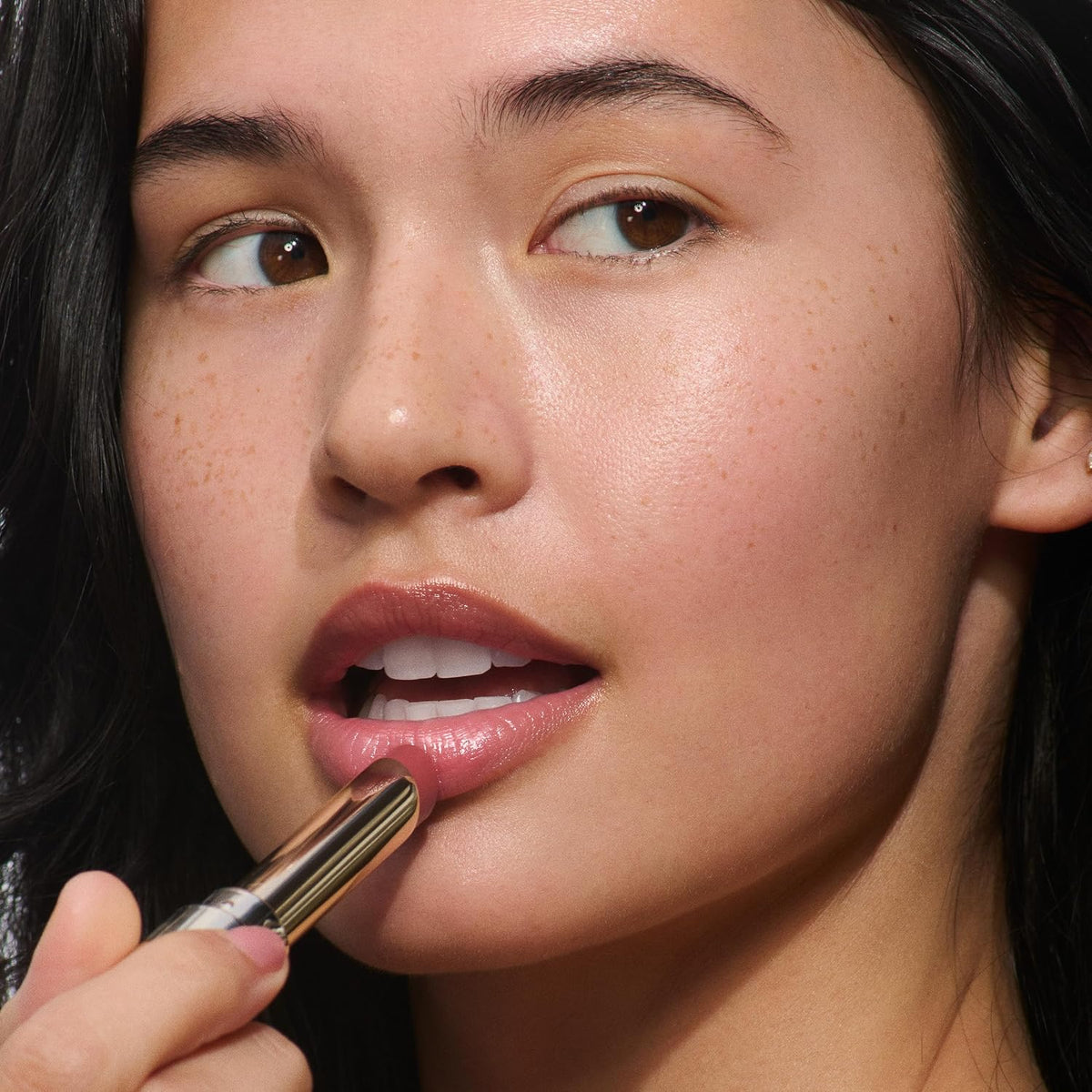 Clarins Lip Oil Balm gold base and translucent pink cap