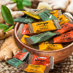 Close up look at the texture of the soft chewy ginger candy piece for digestive health.