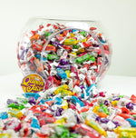 Top view of individual fruit flavored taffy wrappers