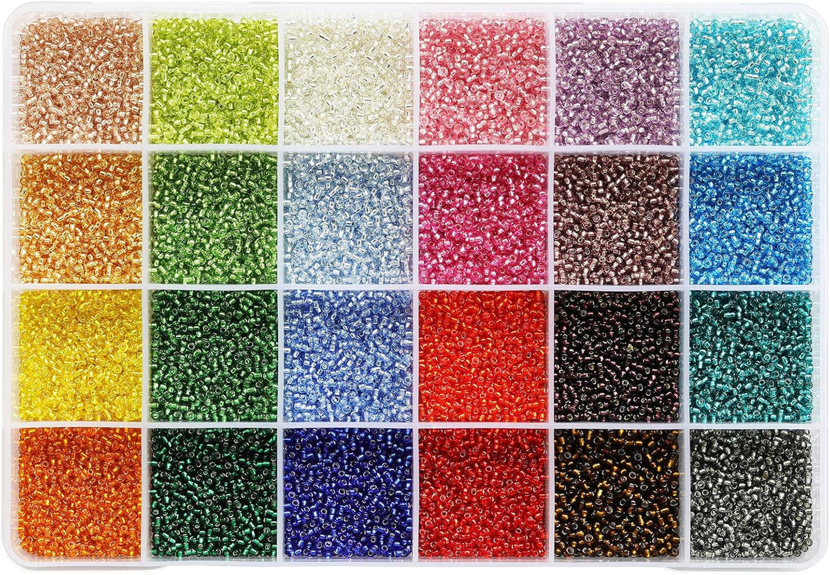 Kergaen assorted color seed beads poured out to show individual bead consistency.