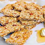 Premium imported sesame snaps candy layout highlighting the honey glaze finish
