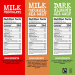 Assorted Belgian dark and milk chocolate bars arranged outside the rainbow tasting pack.