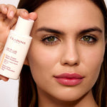 Clarins SPF 50 sunscreen bottle cap and sleek dispenser design