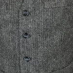 The Celtic Ranch men's herringbone vest interior lining and tag close up