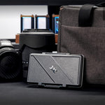 JJC secure snap-on locking mechanism close-up on storage box