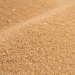 Close up texture of Sandtastik mocha latte coarse sand