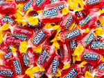 Single unwrapped green apple hard candy piece