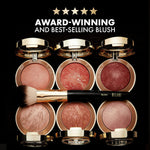Close up view of the slow-baked terracotta powder blush texture in the shade Sunset Passione.