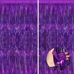 NUWDHP purple metallic tinsel foil fringe curtains front view hanging on a party wall backdrop.