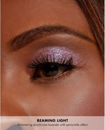 Foil effect prismatic eye look with shimmering lavender eye topper