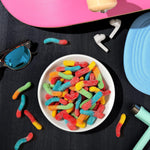 Vibrant and colorful imported American gummy worms for party snacking.