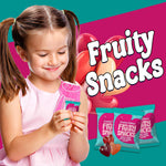 Individually wrapped gluten free Valentine fruit snacks scattered.